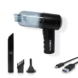 Cordless handheld vacuum with brush, crevice tool, nozzle attachments, and USB charging cable.