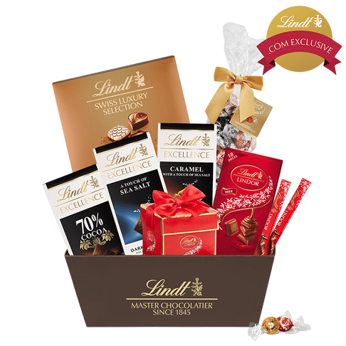 A Lindt chocolate gift basket featuring Swiss Luxury Selection, Excellence bars with sea salt and caramel, Lindor truffles, and chocolate sticks.
