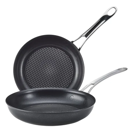 Two frying pans with nonstick interiors and stainless steel handles, featuring a grid pattern on the cooking surface.