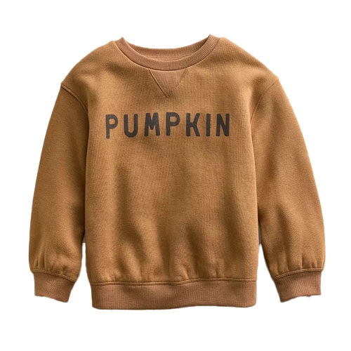 A mustard-colored kids' sweatshirt with the word \“PUMPKIN\“ printed in dark letters across the chest.