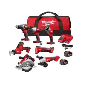 A Milwaukee tool kit featuring a drill, impact driver, angle grinder, circular saw, reciprocating saw, and multi-tool, with a charger, batteries, and a carrying bag.