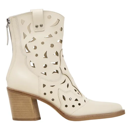 Cream-colored ankle boot with a chunky wooden heel and decorative cutout pattern, featuring a side zipper.