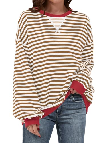 A striped oversized sweatshirt with a combination of brown and white horizontal stripes and red detailing at the collar and cuffs.