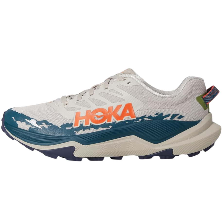 A Hoka brand trail running shoe in white with blue and orange accents, featuring a rugged sole for off-road traction.