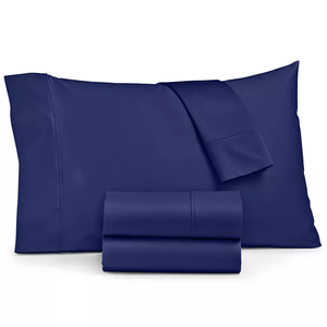 A navy blue bed sheet set including a pillowcase, flat sheet, and fitted sheet.