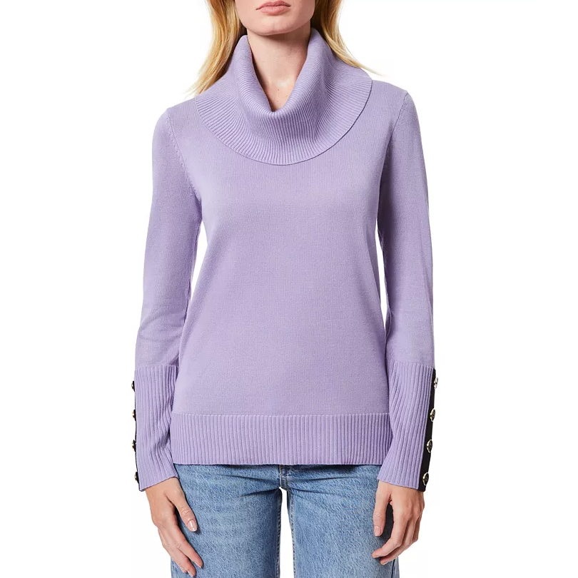A lavender turtleneck sweater with button details on the sleeves, paired with light blue jeans.
