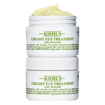 Kiehl's Creamy Eye Treatment with Avocado is pictured, showcasing an open and closed jar against a green background.