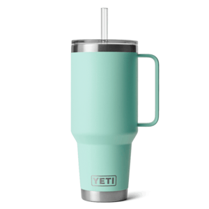 A mint-colored YETI tumbler with a handle, straw, and stainless steel accents.