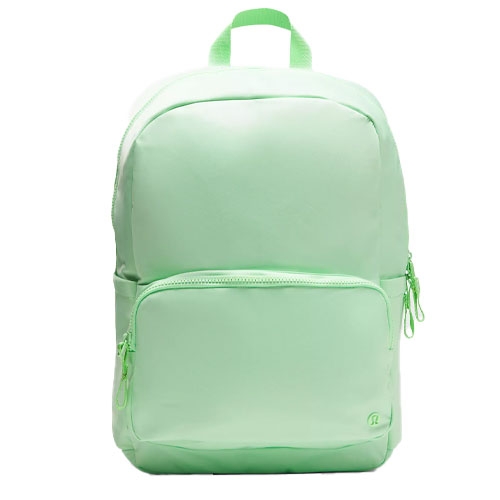 A light green backpack with a large main compartment, a smaller front pocket, and a top handle.