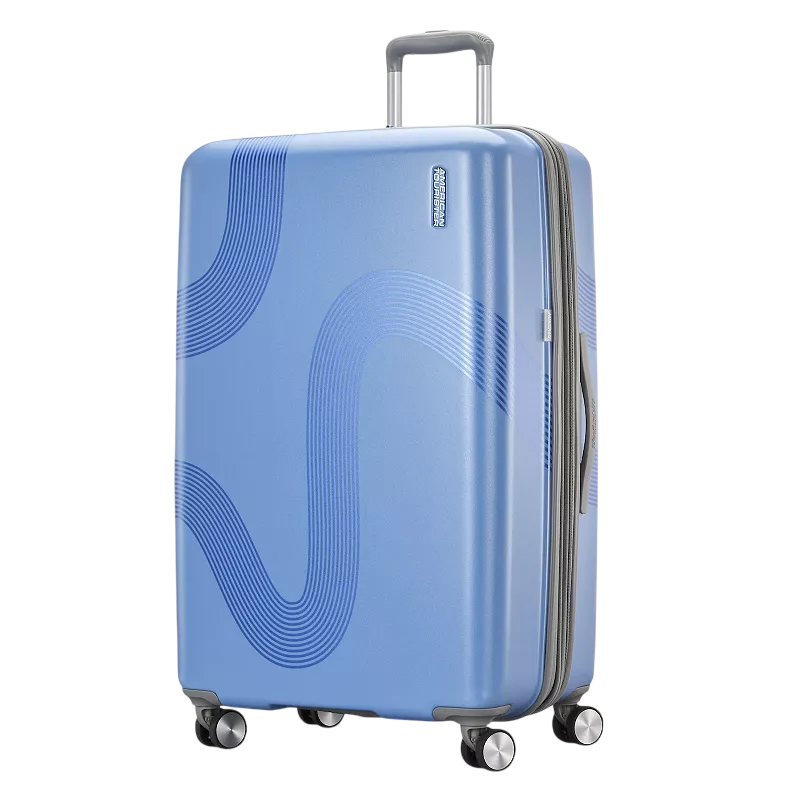 A blue hard-shell suitcase with a modern wave design, featuring four swivel wheels and a telescopic handle for easy maneuverability.