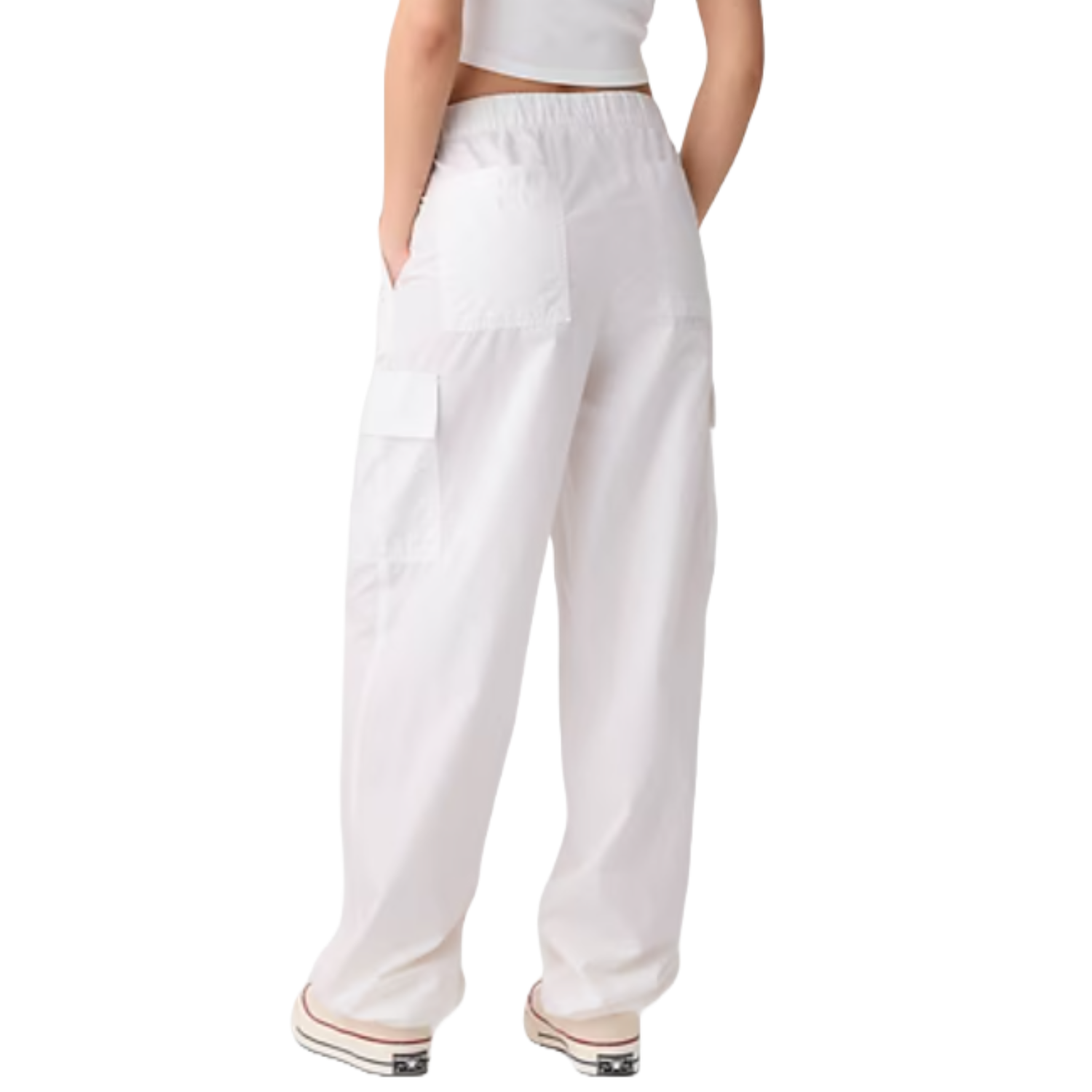 White, high-waisted parachute cargo pants with multiple pockets and a relaxed, wide-leg fit, shown from the back.