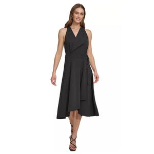 The DKNY A-Line Dress is a knee-length, sleeveless piece with a halter neckline. It features a layered wrap design and a flowy silhouette, perfect for formal occasions.