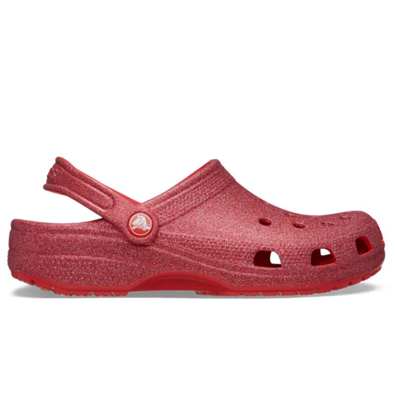 Red Crocs Classic Glitter Clog featuring a glittery finish, ventilated forefoot, pivoting heel strap, and signature circular logo on the side.