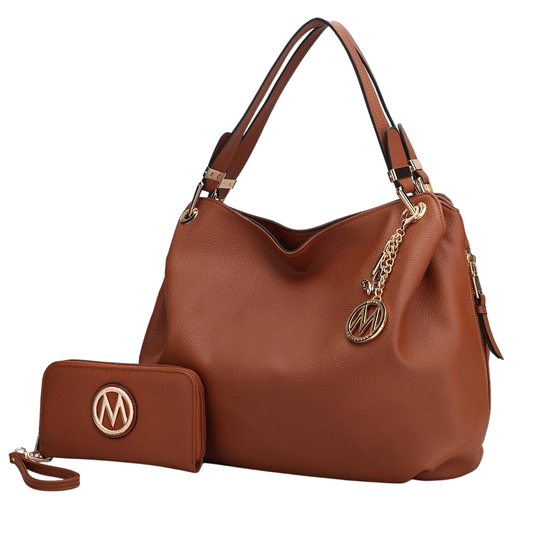 Brown leather handbag with a matching wallet, featuring gold hardware and a circular emblem with the letter \“M.\“
