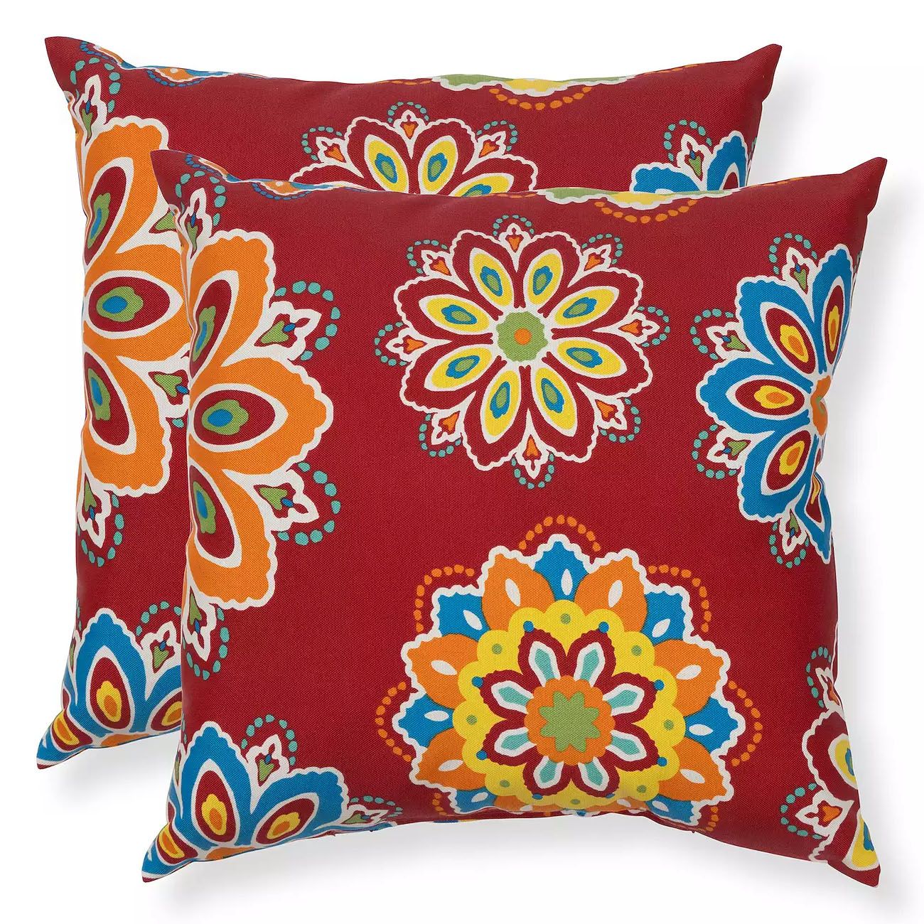 Two decorative pillows featuring a vibrant, multicolored floral pattern on a red background.