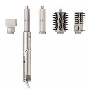 The Shark FlexStyle is a multi-functional hair styling tool with a main unit and attachments, including a concentrator nozzle, two curling barrels, and two brush attachments for drying, curling, and volumizing hair.