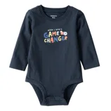 A navy blue long-sleeve baby onesie with the text \“Mom + Dad's Game Changer\“ printed in multicolored letters. It features snap closures at the bottom for easy diaper changes and is size 6 months.