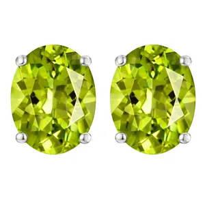 Oval-shaped green gemstones set in a simple stud earring design with four-prong settings.