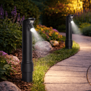 Outdoor pathway lights illuminate a curved walkway, surrounded by flowers and rocks, creating a well-lit garden setting.