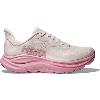 A pink Hoka running shoe with a cushioned sole and white upper, featuring the Hoka logo on the side.