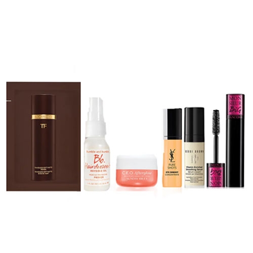 Cosmetics including a foundation, face spray, face serum, and mascaras from multiple brands.