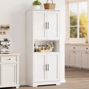 A white kitchen cabinet with four doors, featuring a middle open shelf displaying spices and decor, stands next to a countertop with a coffee maker. There's also a potted plant and a wicker basket on top.