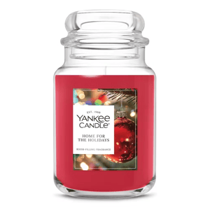 Yankee Candle, Home for the Holidays, in a large glass jar with a red wax featuring a festive theme and room-filling fragrance.