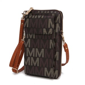 The MKF Phone Crossbody is a compact bag with a print of large repeating \“M\“ letters, featuring brown leather-like straps, zippers, and compartments for organizing essentials.