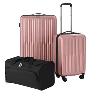 A luggage set including two glossy rose-colored suitcases with ribbed design, one large and one carry-on size, both with wheels and handles, accompanied by a black duffel bag.