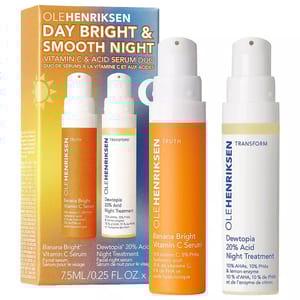 Two Ole Henriksen serum bottles, one labeled \“Banana Bright Vitamin C Serum\“ for day use and the other \“Dewtopia 20% Acid Night Treatment,\“ both in a yellow and white packaging.