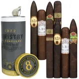 A limited release sampler set featuring eight handcrafted cigars, including brands like Oliva and Rocky Patel, packaged alongside a specially designed canister labeled \“MINISTRY OF SAMPLERS.\“