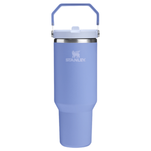 The 40oz Stanley IceFlow Tumbler is a light purple, insulated mug with a handle and secure flip-top lid, designed to keep beverages hot or cold.