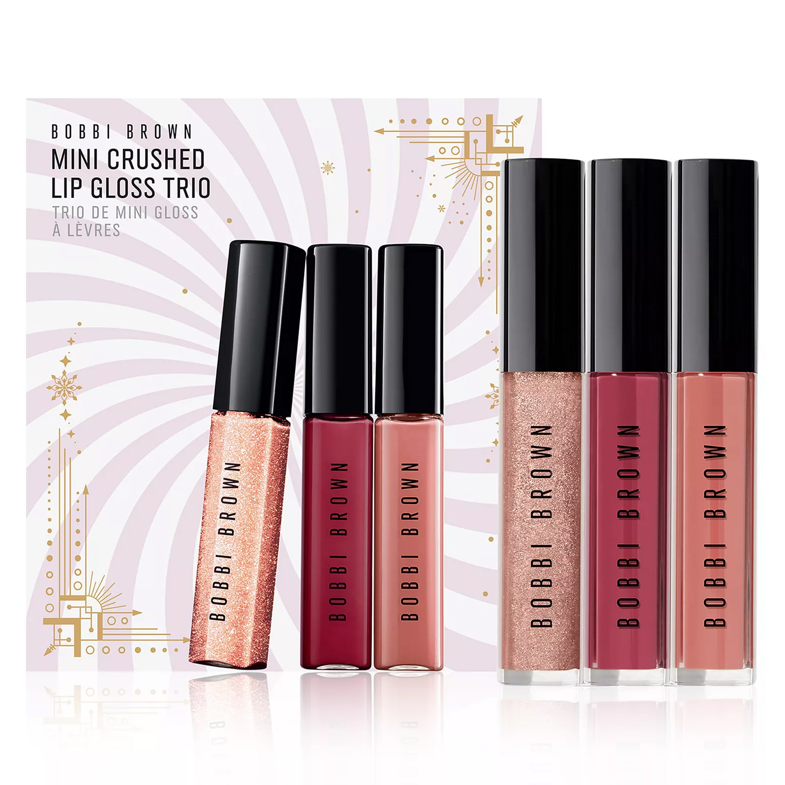 Bobbi Brown Mini Crushed Lip Gloss Trio includes three shimmering gloss shades. The packaging features a festive design with gold accents.