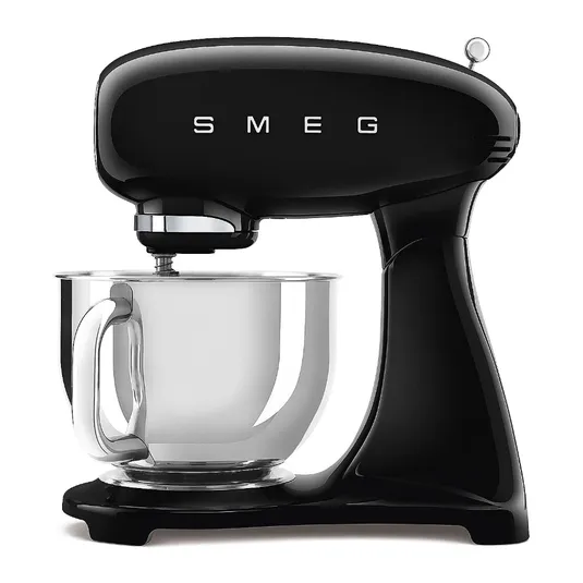 A black SMEG stand mixer with a stainless steel mixing bowl.