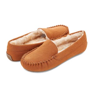 A pair of tan Floopi moccasins with faux fur lining, featuring a stitched design around the toe area, composed of soft material and rubber soles for indoor or light outdoor use.
