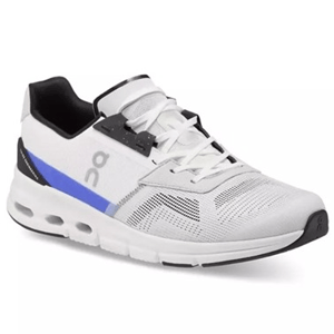 White athletic shoe with black and blue accents, featuring a distinctive sole design and ventilation patterns on the upper.