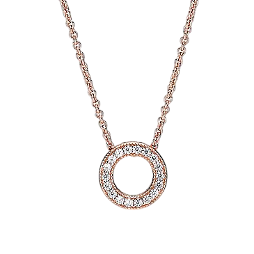 A gold necklace features a circular pendant encrusted with small diamonds or crystals.