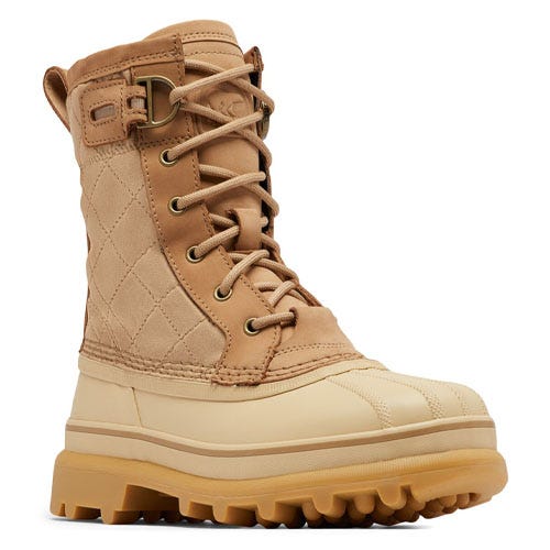 A tan quilted winter boot with a durable, two-tone rubber sole and strong laces for outdoor use.