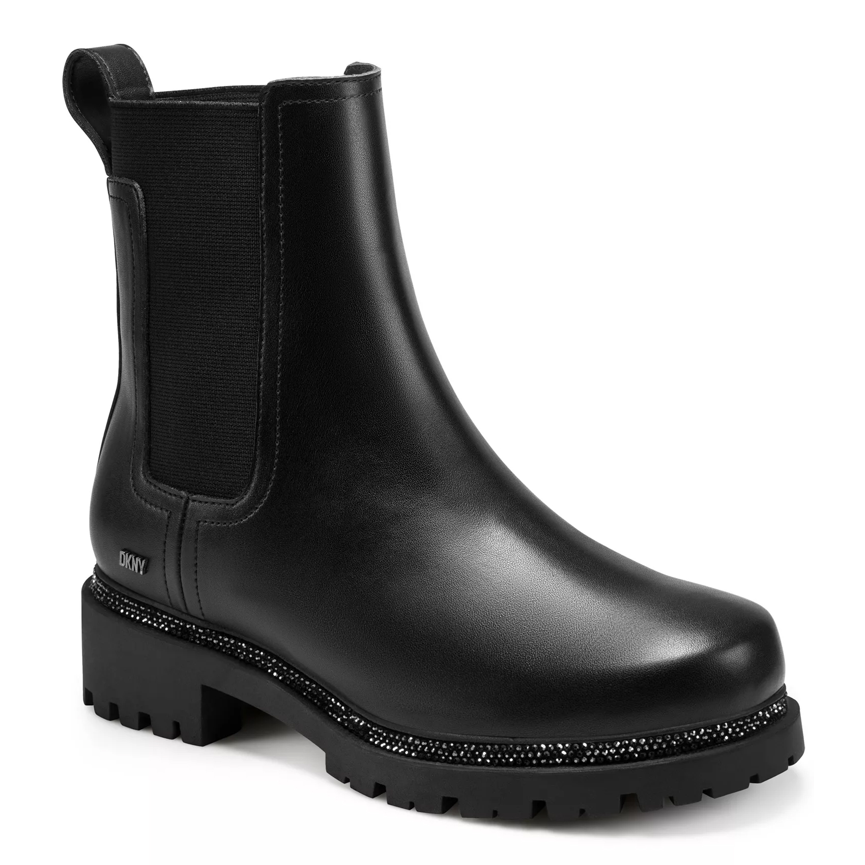 Black Chelsea boot with a chunky lug sole and elastic side panels, featuring subtle logo branding and a beaded detail along the sole edge.