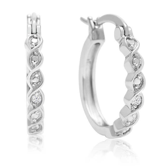 Silver hoop earrings feature a twisted design with diamond accents embedded along the front. The design creates an elegant and intricate appearance, highlighting the sparkling stones.