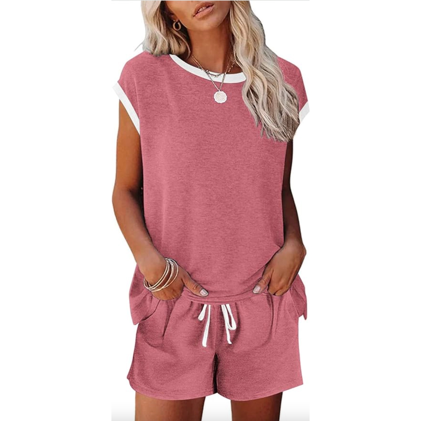 Women's 2-piece pajama set in rose pink includes a short-sleeve top with white trim and matching drawstring shorts with pockets.