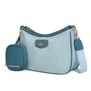 Light blue and teal crossbody bag with a detachable small pouch, featuring gold-tone hardware and a wide, adjustable strap.