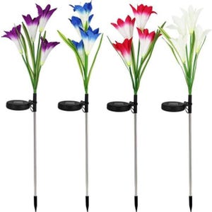 Four solar-powered garden stake lights with LED flowers in purple, blue, red, and white.