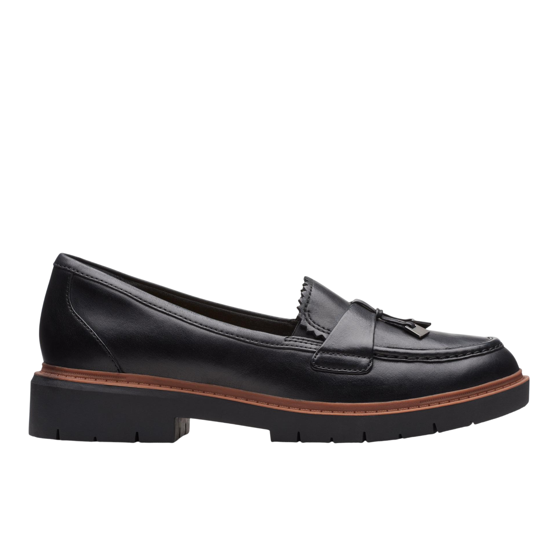 Black leather loafer with a tassel detail, featuring a chunky rubber sole and a brown trim accent.