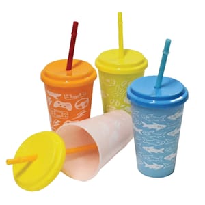 A 3-pack of color-changing tumblers features yellow, orange, and blue cups with matching lids and straws. Each tumbler has distinctive patterns like sharks, controllers, and playful graphics.