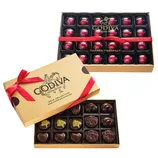 Two Godiva chocolate boxes are shown: one with cherry cordials and another with assorted dark chocolates. The packaging is gold with red ribbons.