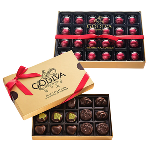 Two Godiva chocolate boxes are shown: one with cherry cordials and another with assorted dark chocolates. The packaging is gold with red ribbons.