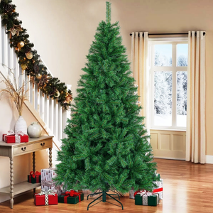 Artificial Christmas tree with a metal stand, set in a decorated living room featuring wrapped gifts, a staircase garland, and a snowy window view.