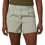 A person wearing light gray, high-waisted shorts with belt loops and pleats, paired with an olive green top.