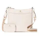 A cream-colored Kate Spade crossbody bag with a matching small pouch, featuring a striped strap with the brand's name.